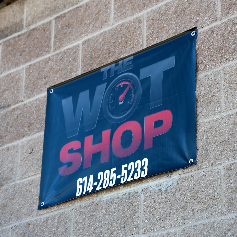 http://The%20WOT%20shop%20sign%20exterior%20of%20building.